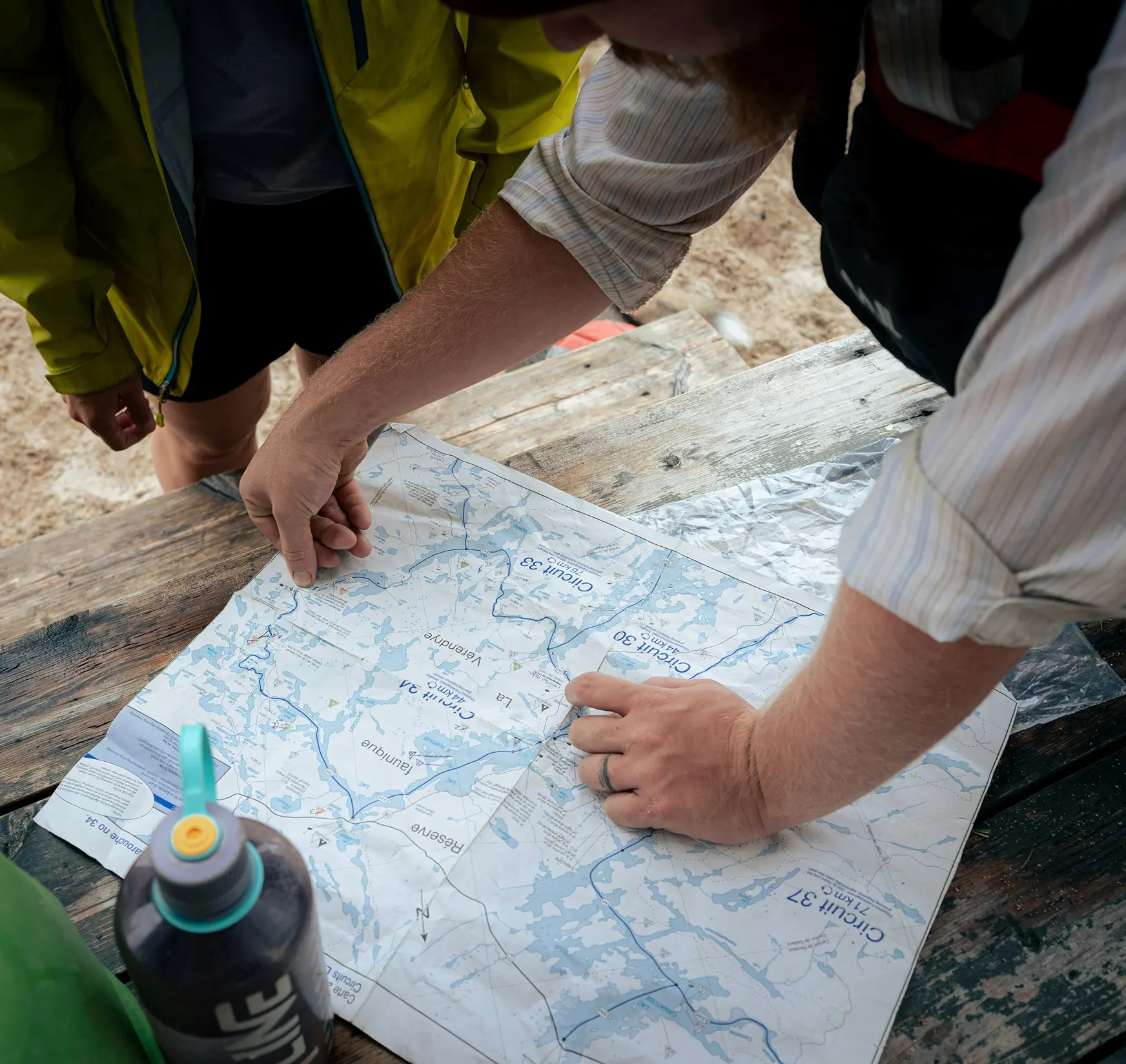 people looking at map